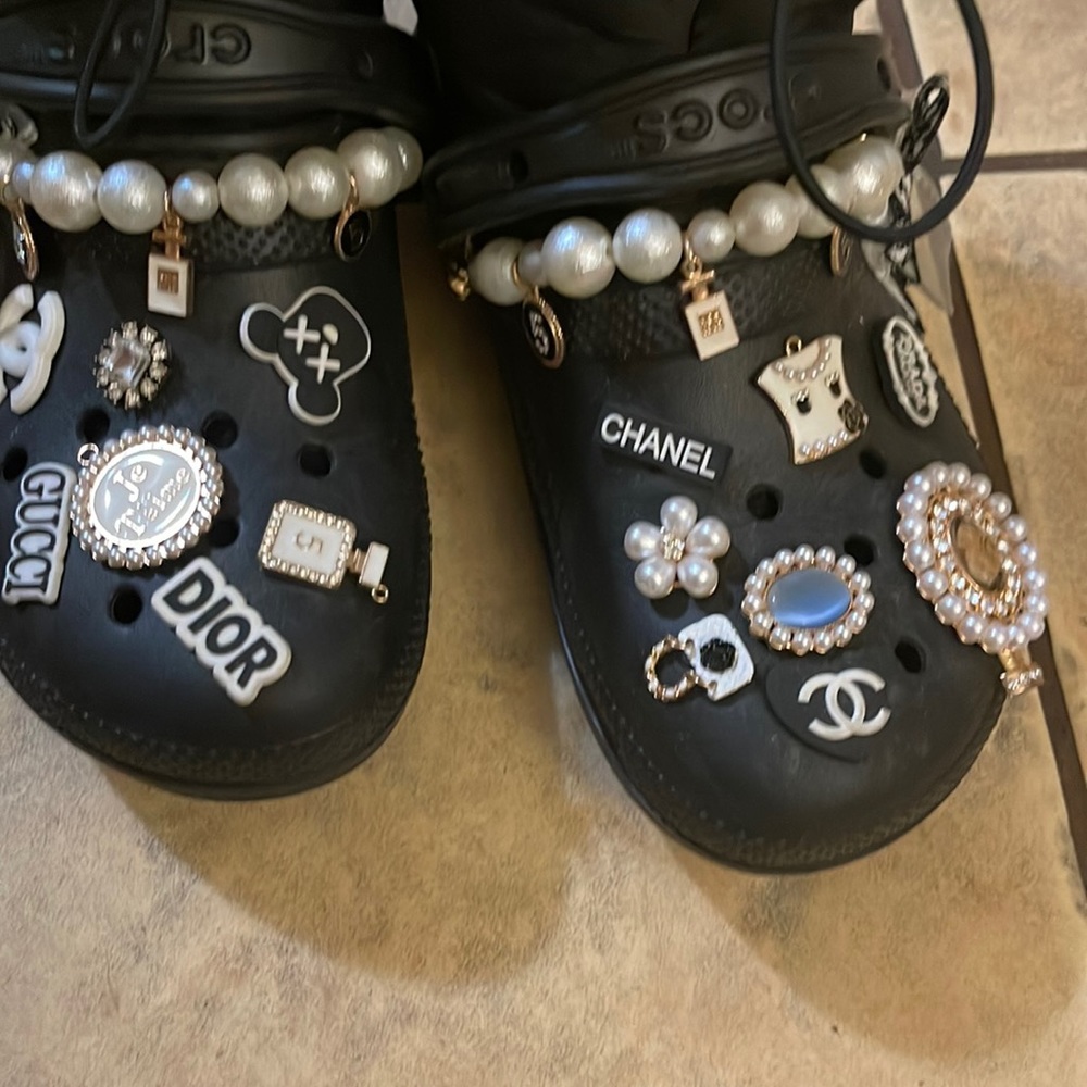 Crocs charms take everything on pic $35